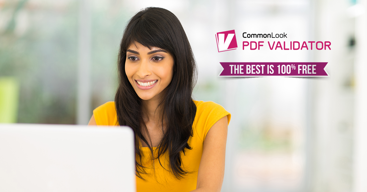 Smiling woman with long brown hair and a yellow top works on her laptop computer.